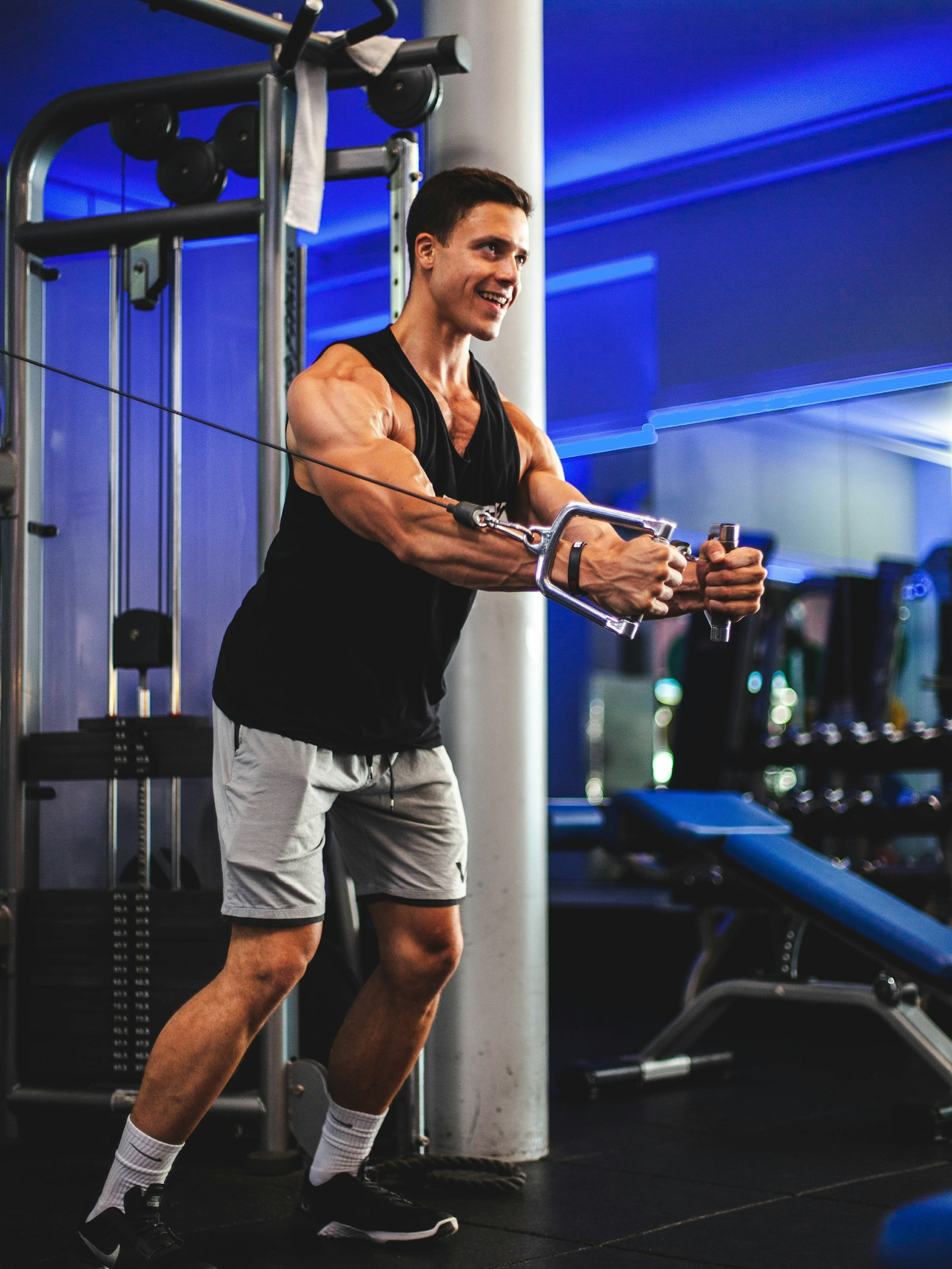 A collection of gym and sport water bottles in various colors and designs, showcasing sleek stainless steel, insulated, and leak-proof bottles arranged with a neutral background and subtle fitness elements, emphasizing hydration and active lifestyles.